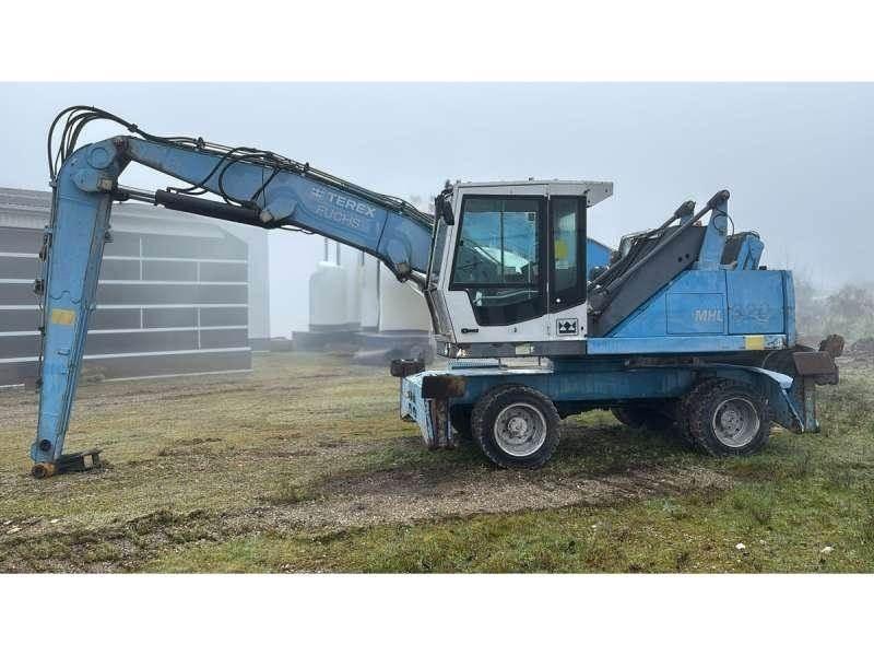 Fuchs MHL320 Stroje pre manipuláciu s odpadom