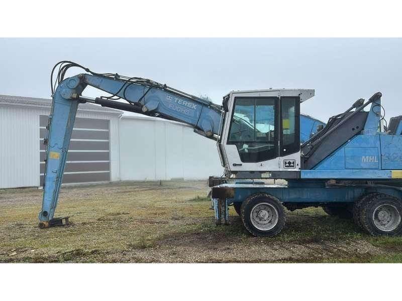Fuchs MHL320 Stroje pre manipuláciu s odpadom