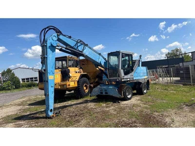 Fuchs MHL320 Stroje pre manipuláciu s odpadom