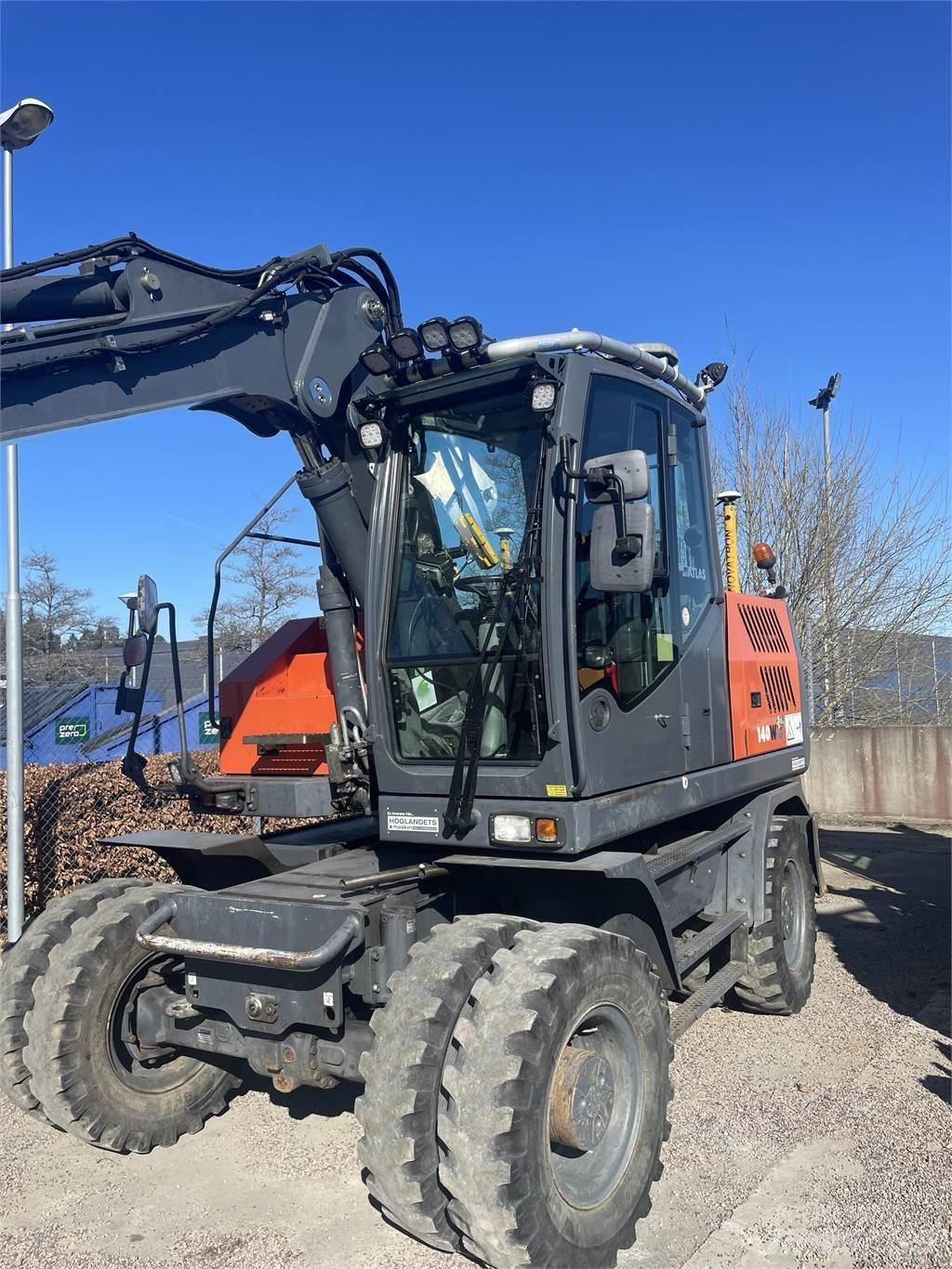 Atlas 140W Kolesové rýpadlá