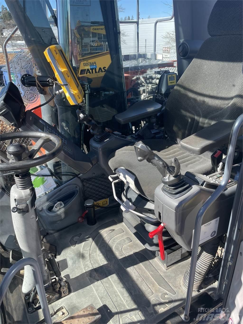 Atlas 140W Kolesové rýpadlá