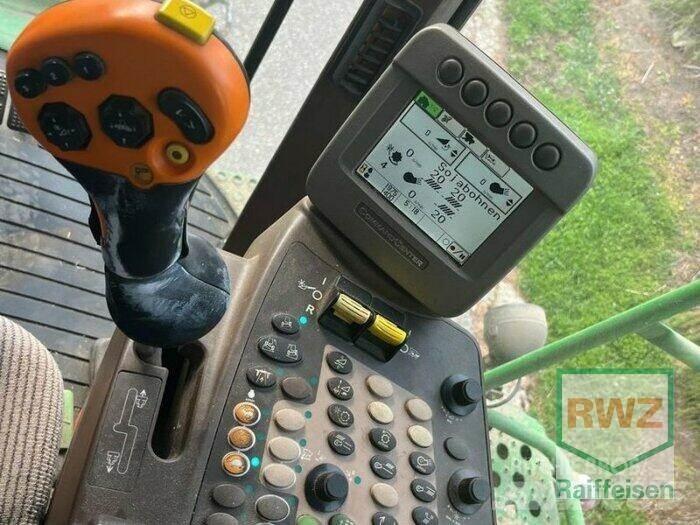 John Deere T560 Kombinované zberacie stroje