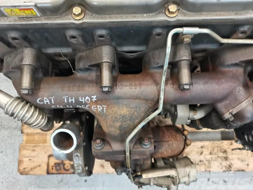 CAT TH 337 exhaust manifold  CAT C4.4 Accert} Motory