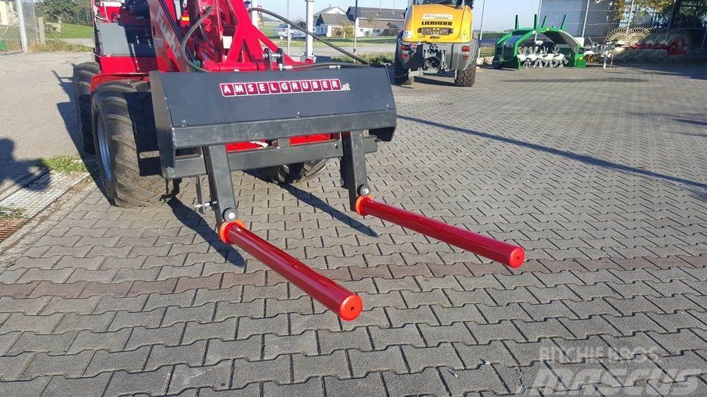  Dominator Ballentransportgabel hydraulisch & Spieß Ďalšie príslušenstvo traktorov