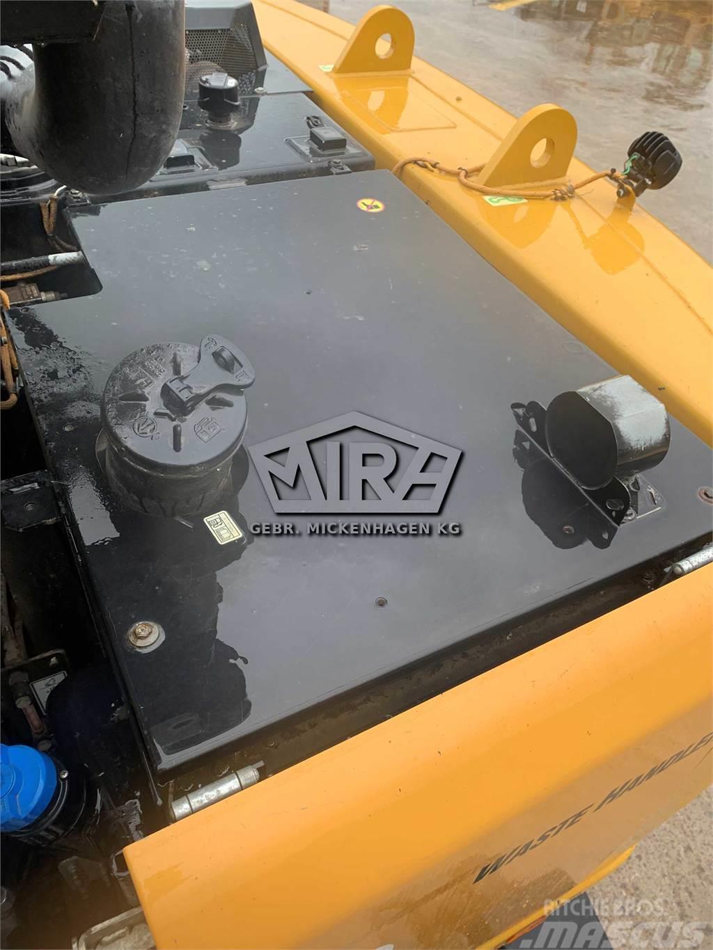 CAT MH3022 Stroje pre manipuláciu s odpadom