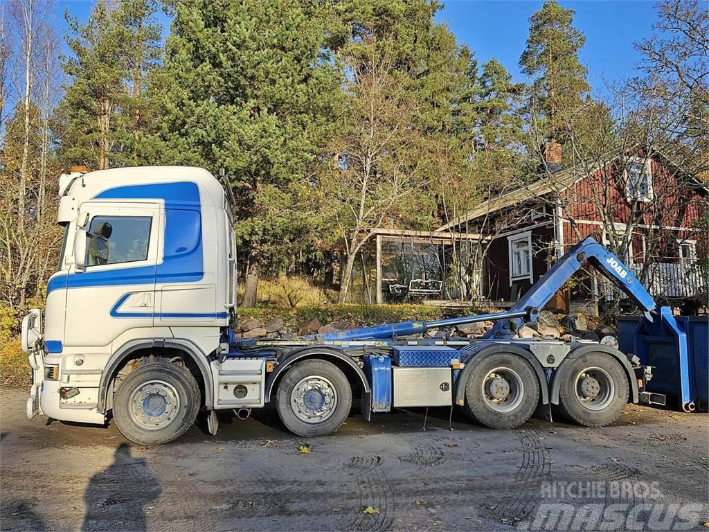 Scania R560 8x4 koukku Hákový nosič kontajnerov
