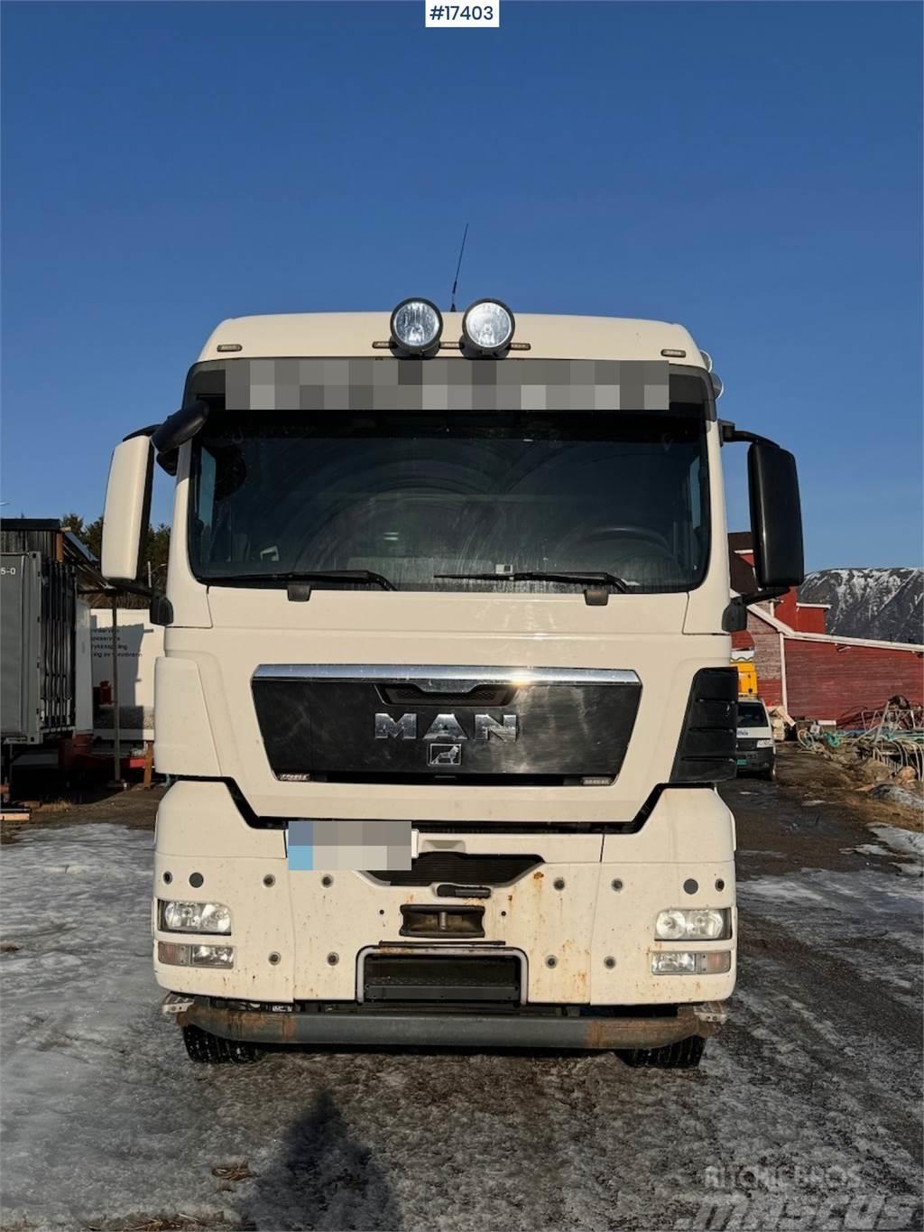 MAN TGX 35.480 8x4 flatbed truck w/ driving bridges Plošinové nákladné automobily/nákladné automobily so sklápacími bočnicami