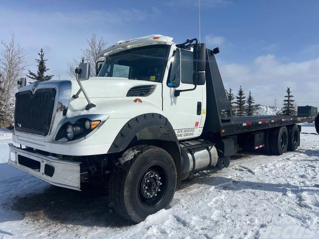 International 7600 SBA 6X4 Equipment Tow Deck Truck Plošinové nákladné automobily/nákladné automobily so sklápacími bočnicami