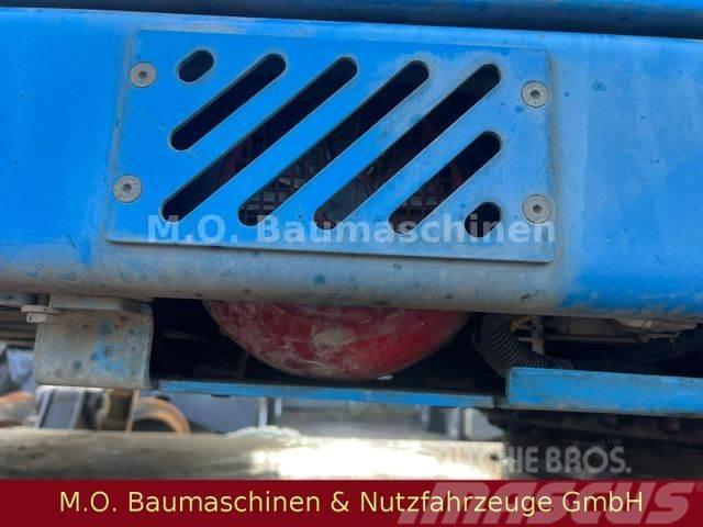 Fuchs MHL 331 / ZSA / AC / Hochfahrbare Kabine /Magnet Kolesové rýpadlá