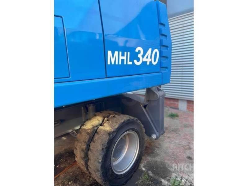 Fuchs MHL340 Stroje pre manipuláciu s odpadom